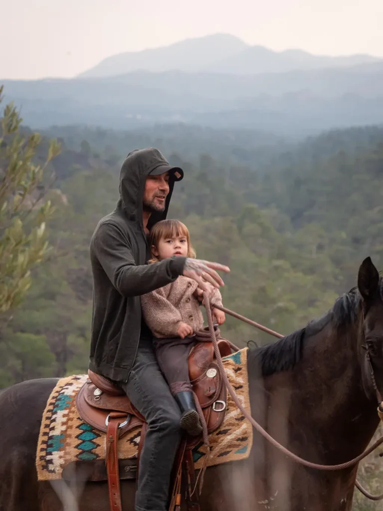 man and child on horse for horse holidays at rock rose ranch
