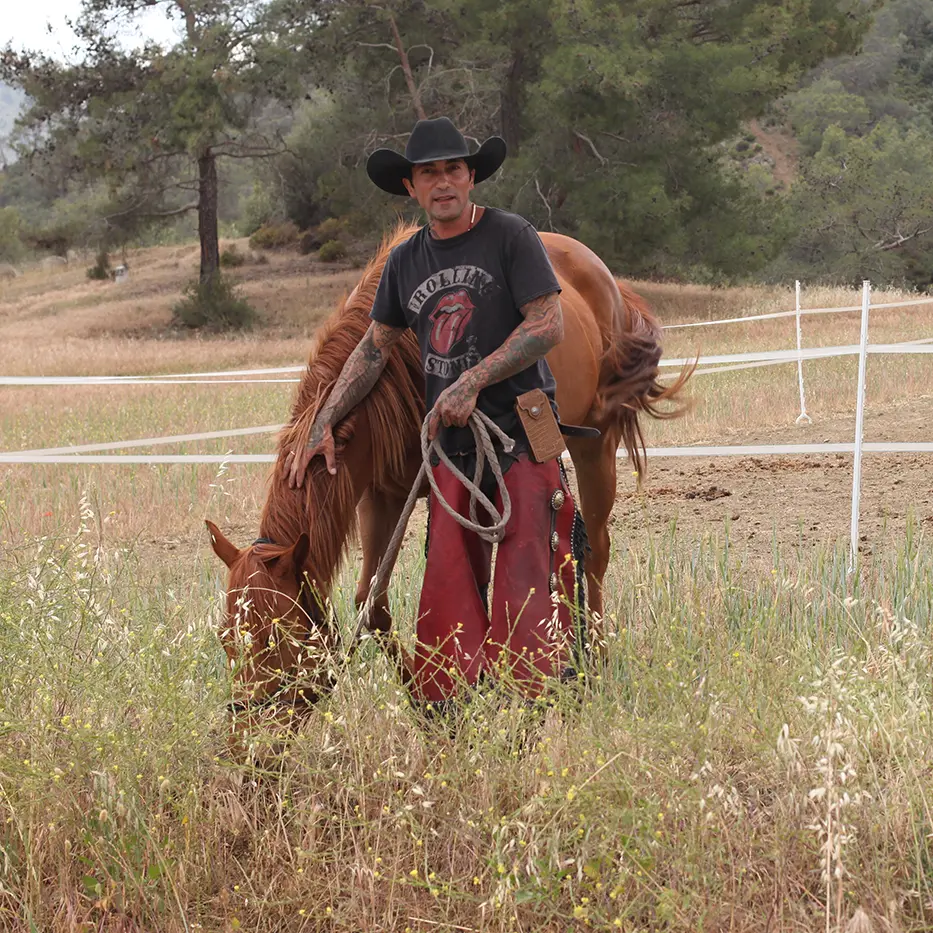 man and horse western riding experience at rock rose ranch