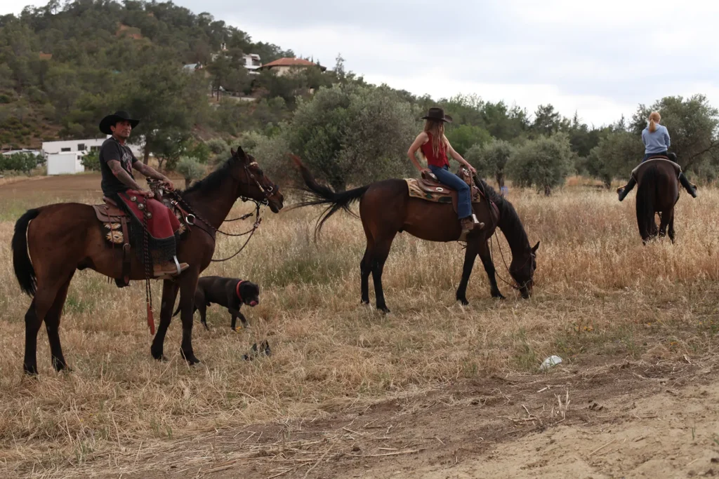 group riding a horses western trail riding in Cyprus